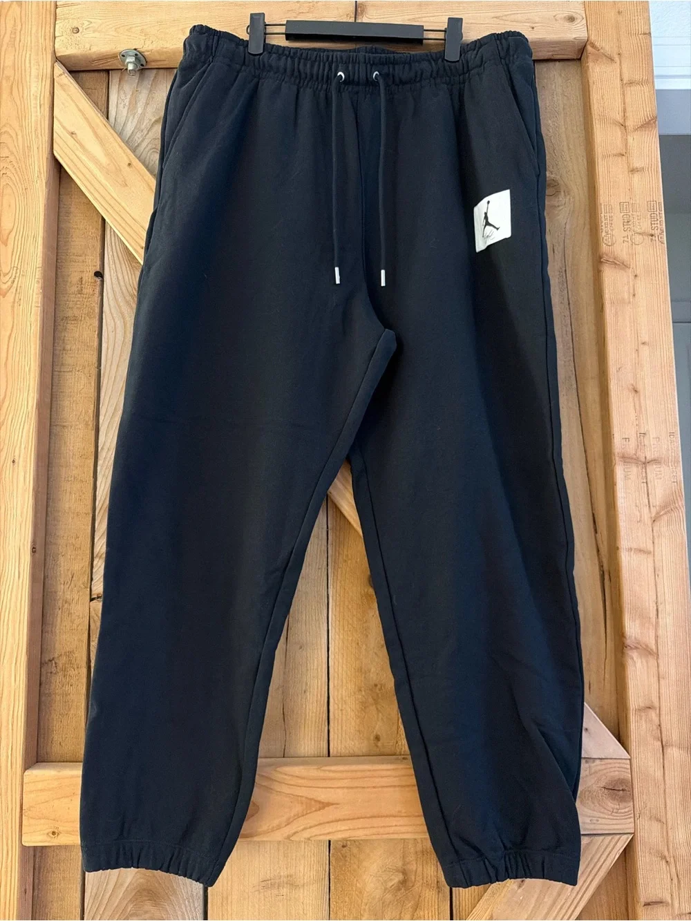Nike Jordan Flight Fleece Black Jogger Sweatpants with White Jumpman Patch